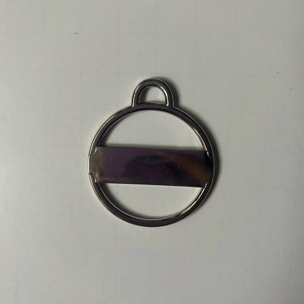 COACH METAL BAG CHARM